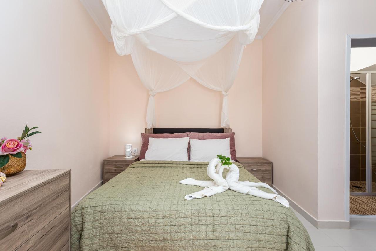 Fouki Apartments Ipsos Beach Екстер'єр фото